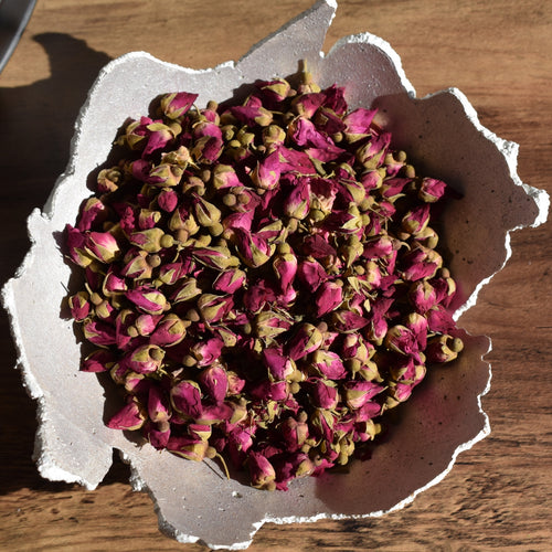 Dried red rose buds